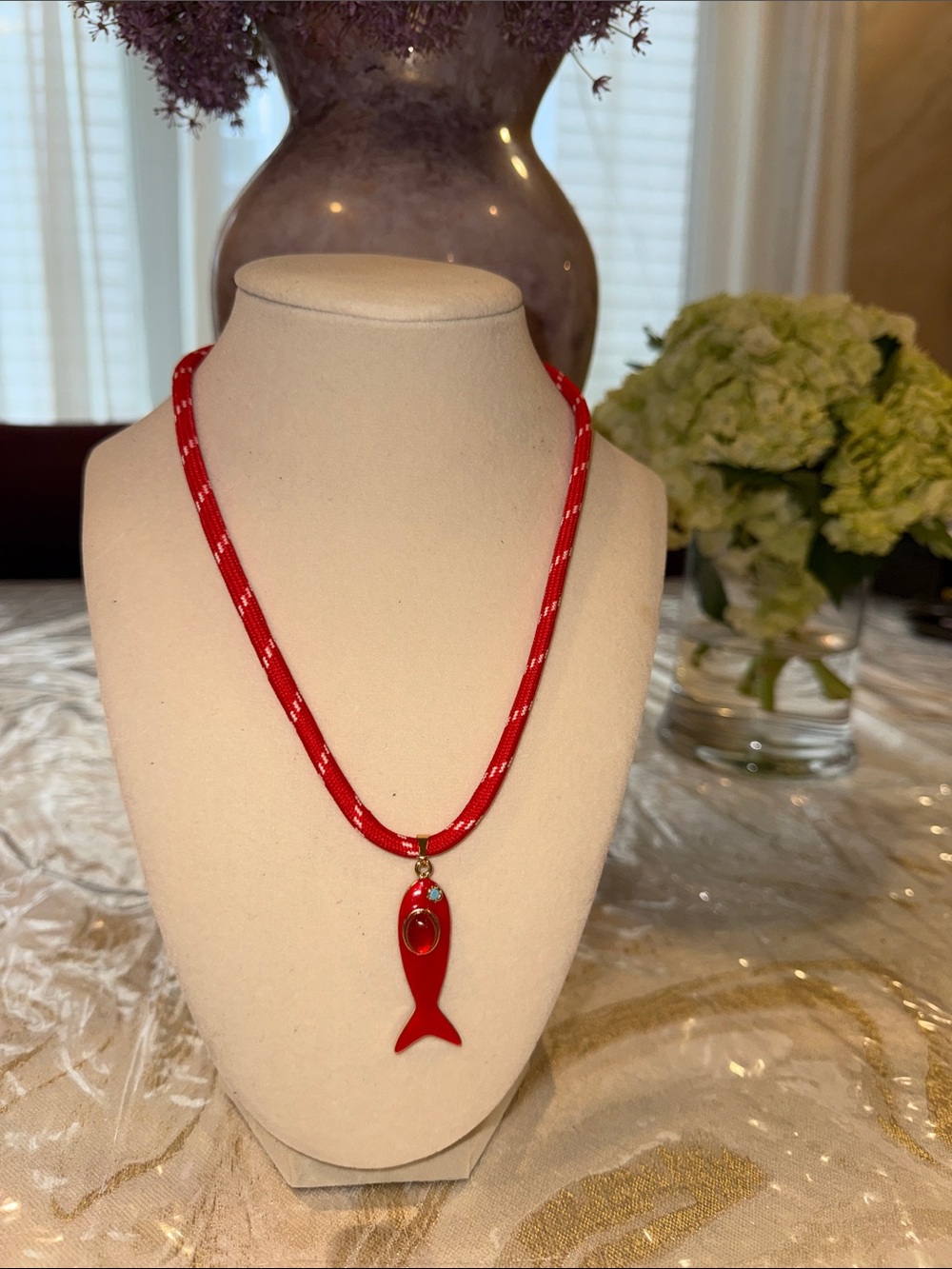 Red Fish Pendant Necklace on red striped rope with gold extension
